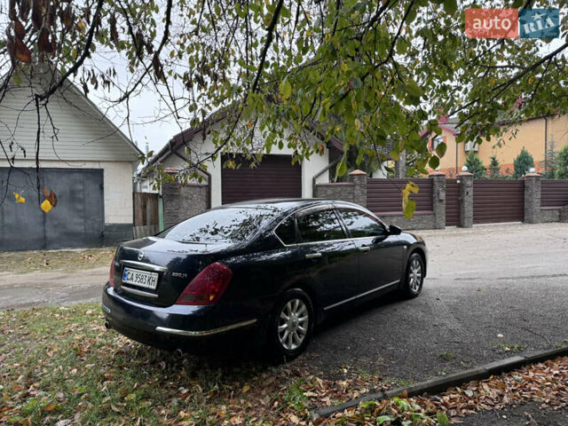 Черный Ниссан Теана, объемом двигателя 2 л и пробегом 170 тыс. км за 5500 $, фото 4 на Automoto.ua