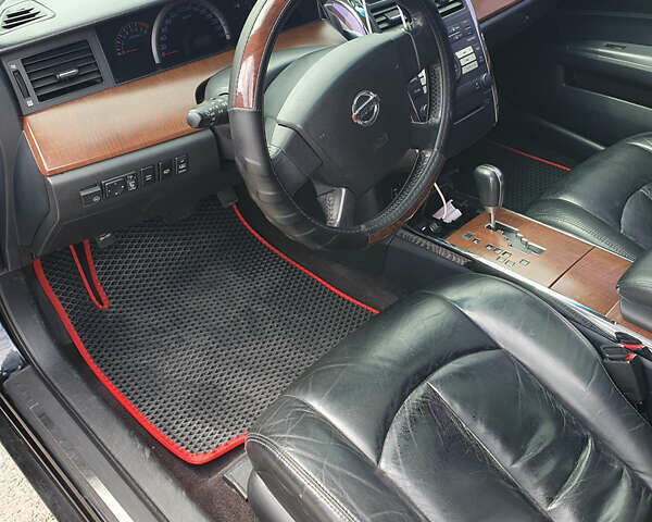 Черный Ниссан Теана, объемом двигателя 2.35 л и пробегом 216 тыс. км за 5000 $, фото 3 на Automoto.ua