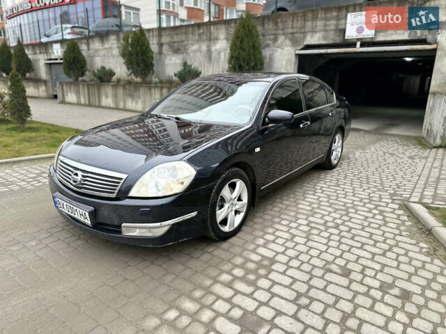 Черный Ниссан Теана, объемом двигателя 3.5 л и пробегом 315 тыс. км за 4500 $, фото 1 на Automoto.ua
