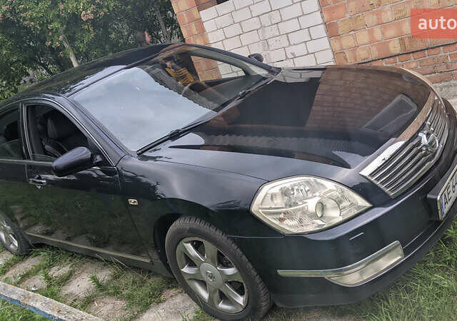 Черный Ниссан Теана, объемом двигателя 3.5 л и пробегом 151 тыс. км за 6300 $, фото 19 на Automoto.ua