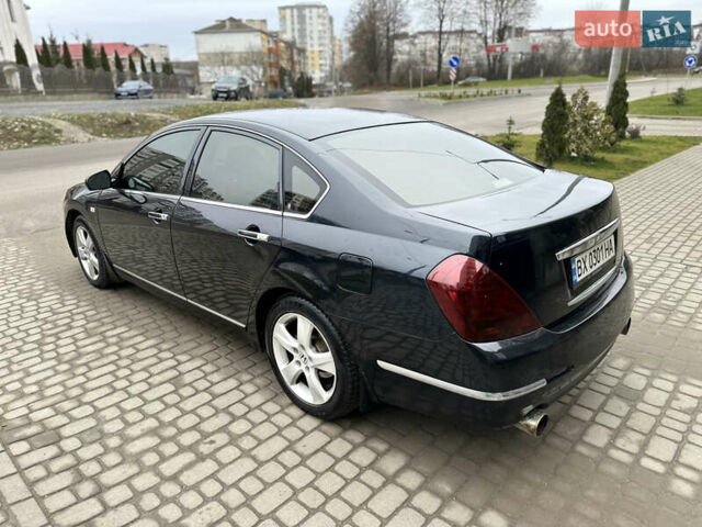 Черный Ниссан Теана, объемом двигателя 3.5 л и пробегом 315 тыс. км за 4500 $, фото 24 на Automoto.ua
