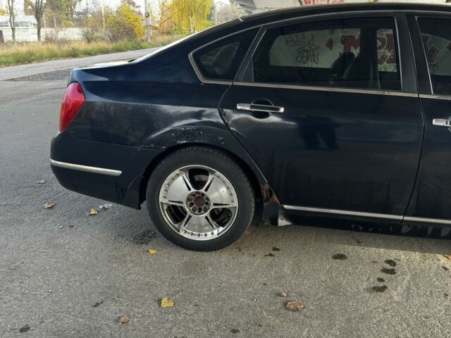 Чорний Ніссан Теана, об'ємом двигуна 3.5 л та пробігом 273 тис. км за 4200 $, фото 4 на Automoto.ua