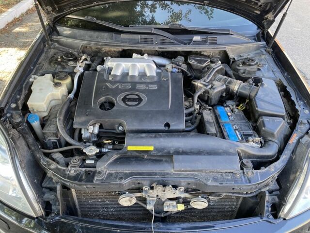 Чорний Ніссан Теана, об'ємом двигуна 3.5 л та пробігом 223 тис. км за 5800 $, фото 4 на Automoto.ua