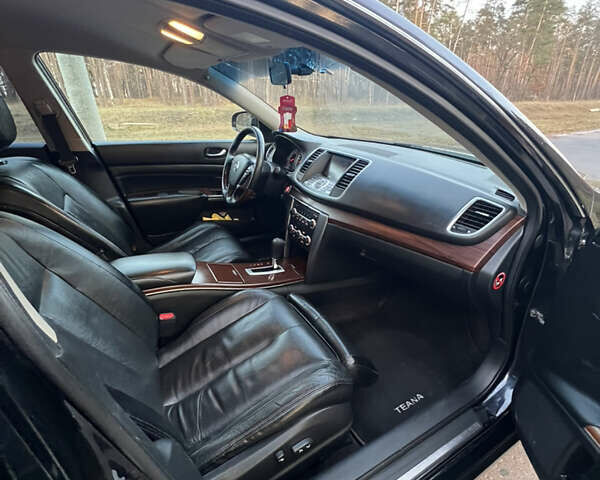 Черный Ниссан Теана, объемом двигателя 2.5 л и пробегом 190 тыс. км за 6900 $, фото 5 на Automoto.ua