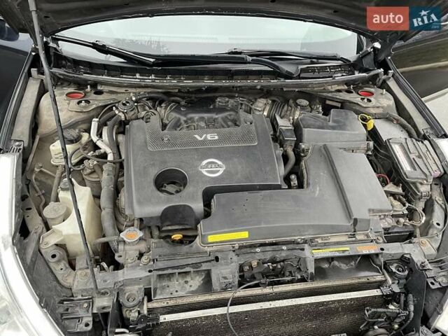 Черный Ниссан Теана, объемом двигателя 2.5 л и пробегом 241 тыс. км за 7000 $, фото 23 на Automoto.ua