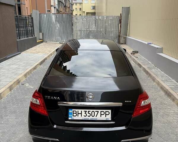 Черный Ниссан Теана, объемом двигателя 2.5 л и пробегом 210 тыс. км за 7400 $, фото 5 на Automoto.ua