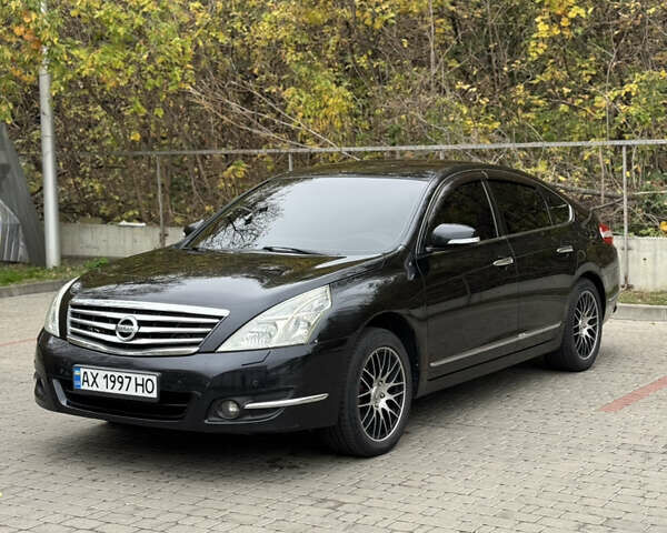 Черный Ниссан Теана, объемом двигателя 2.5 л и пробегом 246 тыс. км за 6100 $, фото 3 на Automoto.ua