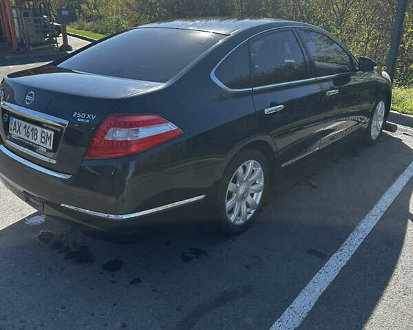 Черный Ниссан Теана, объемом двигателя 2.5 л и пробегом 71 тыс. км за 9000 $, фото 3 на Automoto.ua