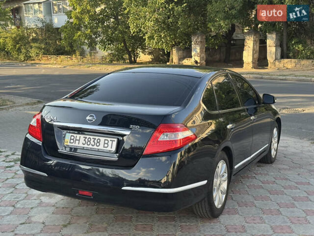 Чорний Ніссан Теана, об'ємом двигуна 2.5 л та пробігом 174 тис. км за 7799 $, фото 4 на Automoto.ua