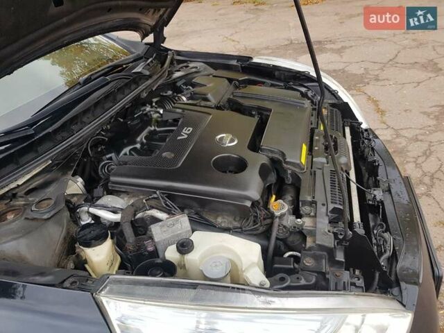 Черный Ниссан Теана, объемом двигателя 2.5 л и пробегом 302 тыс. км за 7250 $, фото 45 на Automoto.ua