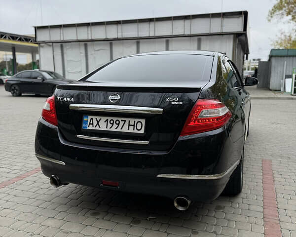 Черный Ниссан Теана, объемом двигателя 2.5 л и пробегом 246 тыс. км за 6100 $, фото 4 на Automoto.ua