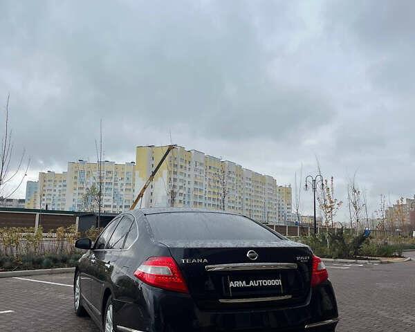 Черный Ниссан Теана, объемом двигателя 2.5 л и пробегом 265 тыс. км за 5990 $, фото 19 на Automoto.ua