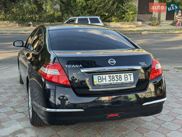 Чорний Ніссан Теана, об'ємом двигуна 2.5 л та пробігом 174 тис. км за 7799 $, фото 6 на Automoto.ua
