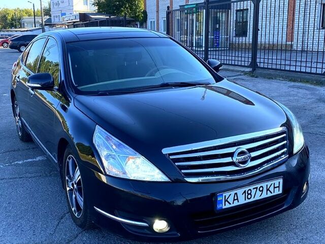 Черный Ниссан Теана, объемом двигателя 3.5 л и пробегом 350 тыс. км за 5900 $, фото 2 на Automoto.ua