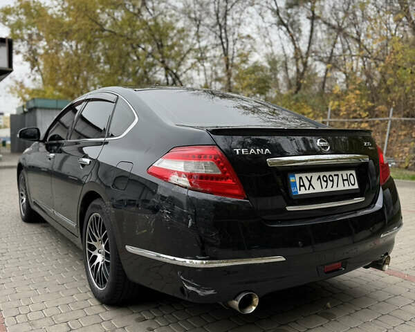 Черный Ниссан Теана, объемом двигателя 2.5 л и пробегом 246 тыс. км за 6100 $, фото 5 на Automoto.ua
