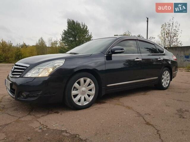 Ниссан Теана 2008 в Мене на Automoto.ua Черный Ниссан Теана, объемом двигателя 2.5 л и пробегом 303 тыс. км за 6950 $, фото 5 на Automoto.ua