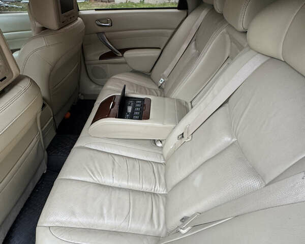 Черный Ниссан Теана, объемом двигателя 2.5 л и пробегом 246 тыс. км за 6100 $, фото 8 на Automoto.ua