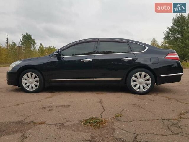 Черный Ниссан Теана, объемом двигателя 2.5 л и пробегом 302 тыс. км за 7250 $, фото 5 на Automoto.ua