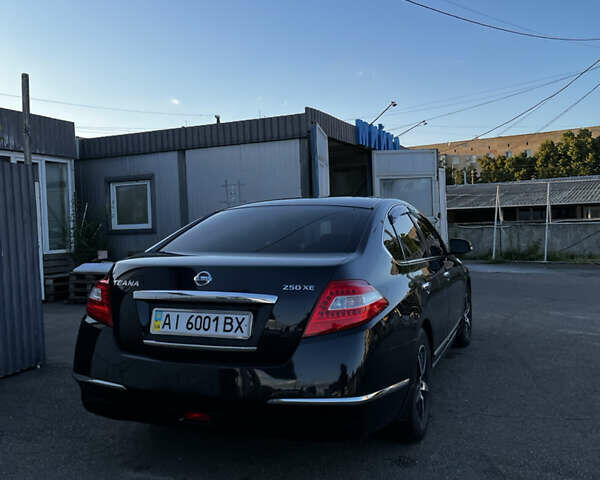 Черный Ниссан Теана, объемом двигателя 2.5 л и пробегом 286 тыс. км за 7400 $, фото 26 на Automoto.ua