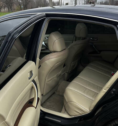 Черный Ниссан Теана, объемом двигателя 3.5 л и пробегом 215 тыс. км за 7700 $, фото 19 на Automoto.ua