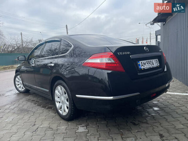 Черный Ниссан Теана, объемом двигателя 2.5 л и пробегом 285 тыс. км за 6700 $, фото 2 на Automoto.ua