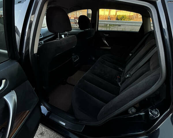 Черный Ниссан Теана, объемом двигателя 2.5 л и пробегом 286 тыс. км за 7400 $, фото 19 на Automoto.ua