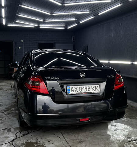 Черный Ниссан Теана, объемом двигателя 3.5 л и пробегом 215 тыс. км за 7700 $, фото 2 на Automoto.ua