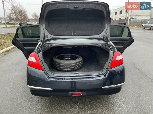 Черный Ниссан Теана, объемом двигателя 2.5 л и пробегом 241 тыс. км за 7000 $, фото 21 на Automoto.ua