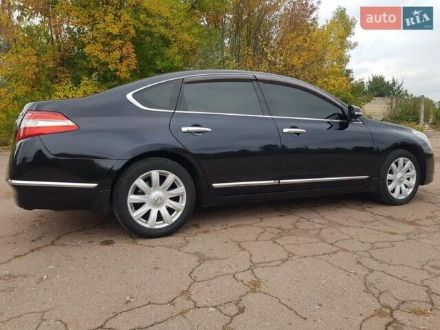 Ниссан Теана 2008 в Мене на Automoto.ua Черный Ниссан Теана, объемом двигателя 2.5 л и пробегом 303 тыс. км за 6950 $, фото 12 на Automoto.ua