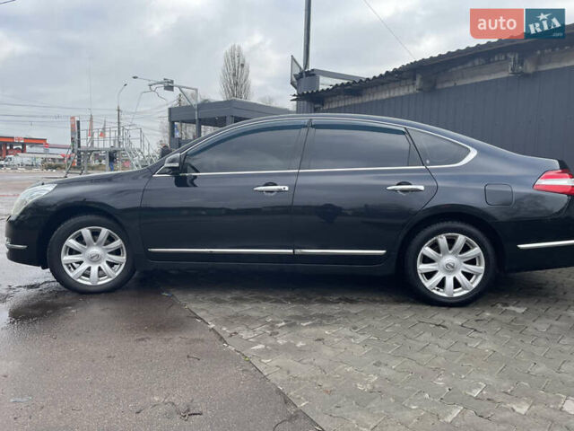 Черный Ниссан Теана, объемом двигателя 2.5 л и пробегом 285 тыс. км за 6700 $, фото 3 на Automoto.ua