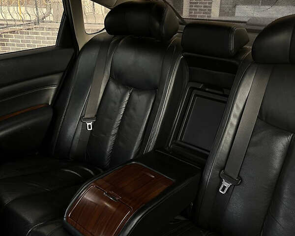 Черный Ниссан Теана, объемом двигателя 2.5 л и пробегом 265 тыс. км за 5990 $, фото 43 на Automoto.ua