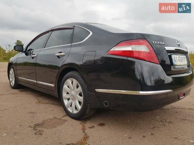 Черный Ниссан Теана, объемом двигателя 2.5 л и пробегом 302 тыс. км за 7250 $, фото 13 на Automoto.ua