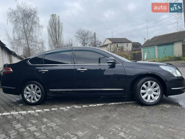 Черный Ниссан Теана, объемом двигателя 2.5 л и пробегом 285 тыс. км за 6700 $, фото 4 на Automoto.ua