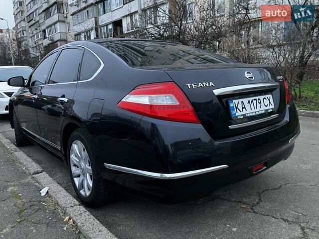 Черный Ниссан Теана, объемом двигателя 3.5 л и пробегом 149 тыс. км за 9000 $, фото 2 на Automoto.ua