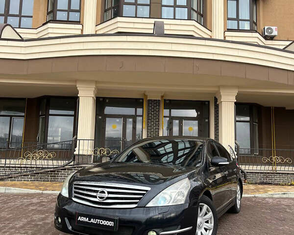 Черный Ниссан Теана, объемом двигателя 2.5 л и пробегом 265 тыс. км за 5990 $, фото 1 на Automoto.ua