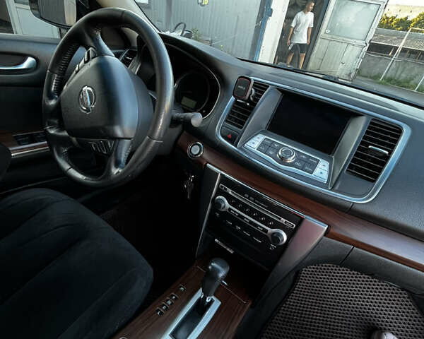 Черный Ниссан Теана, объемом двигателя 2.5 л и пробегом 286 тыс. км за 7400 $, фото 5 на Automoto.ua