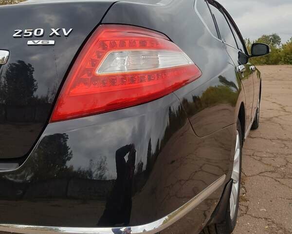 Черный Ниссан Теана, объемом двигателя 2.5 л и пробегом 302 тыс. км за 7250 $, фото 9 на Automoto.ua