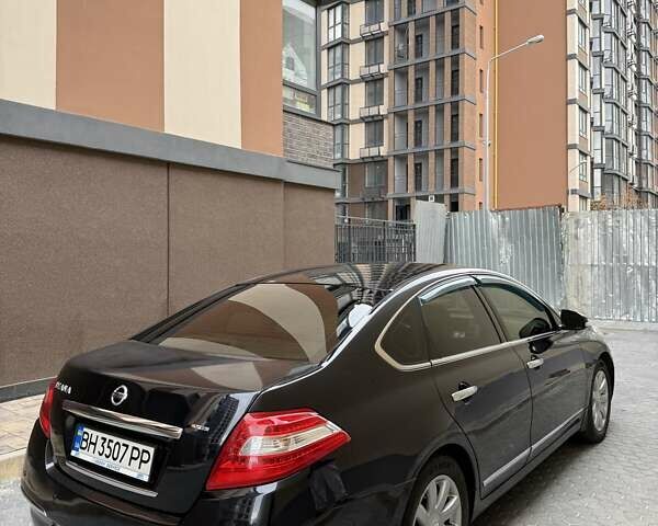 Черный Ниссан Теана, объемом двигателя 2.5 л и пробегом 210 тыс. км за 7400 $, фото 4 на Automoto.ua