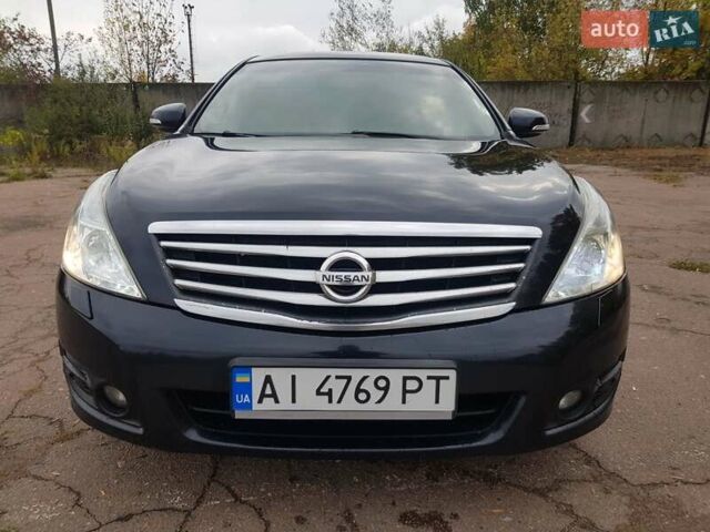 Черный Ниссан Теана, объемом двигателя 2.5 л и пробегом 302 тыс. км за 7250 $, фото 2 на Automoto.ua