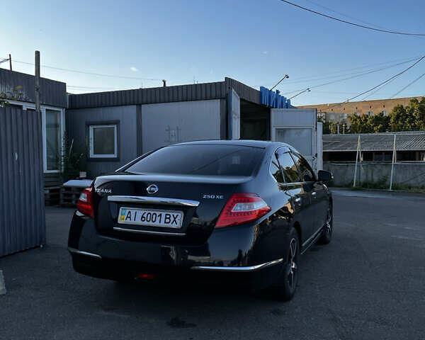Черный Ниссан Теана, объемом двигателя 2.5 л и пробегом 286 тыс. км за 7400 $, фото 2 на Automoto.ua