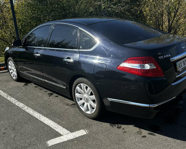 Черный Ниссан Теана, объемом двигателя 2.5 л и пробегом 71 тыс. км за 9000 $, фото 2 на Automoto.ua