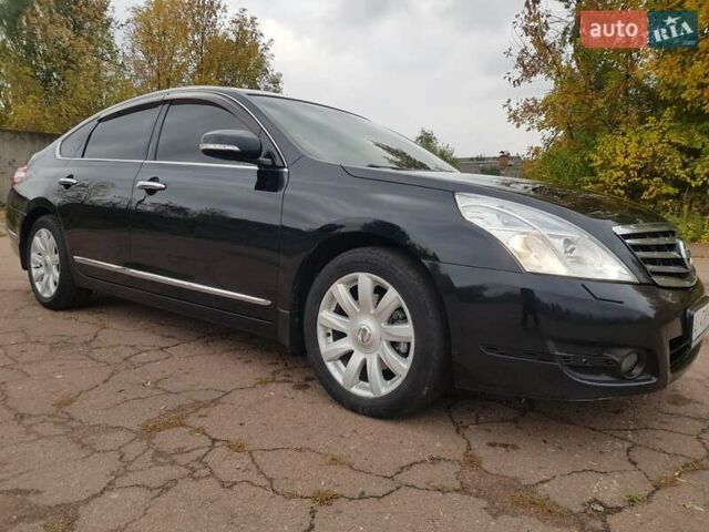 Черный Ниссан Теана, объемом двигателя 2.5 л и пробегом 302 тыс. км за 7250 $, фото 12 на Automoto.ua