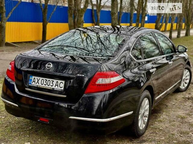 Чорний Ніссан Теана, об'ємом двигуна 2.5 л та пробігом 265 тис. км за 8000 $, фото 4 на Automoto.ua