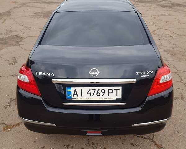 Ниссан Теана 2008 в Мене на Automoto.ua Черный Ниссан Теана, объемом двигателя 2.5 л и пробегом 303 тыс. км за 6950 $, фото 14 на Automoto.ua