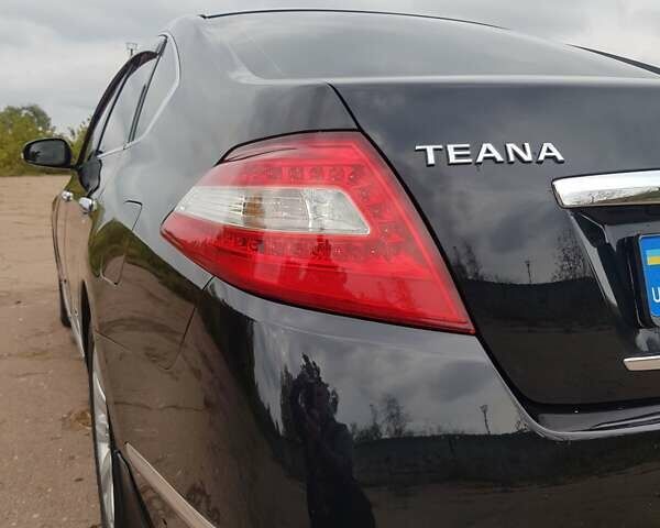 Ниссан Теана 2008 в Мене на Automoto.ua Черный Ниссан Теана, объемом двигателя 2.5 л и пробегом 303 тыс. км за 6950 $, фото 9 на Automoto.ua