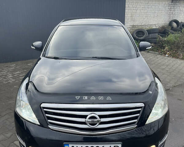 Черный Ниссан Теана, объемом двигателя 2.5 л и пробегом 285 тыс. км за 6700 $, фото 1 на Automoto.ua