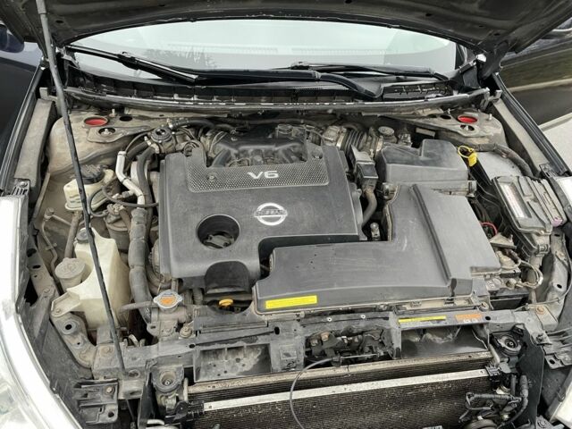 Черный Ниссан Теана, объемом двигателя 2.5 л и пробегом 241 тыс. км за 7000 $, фото 21 на Automoto.ua