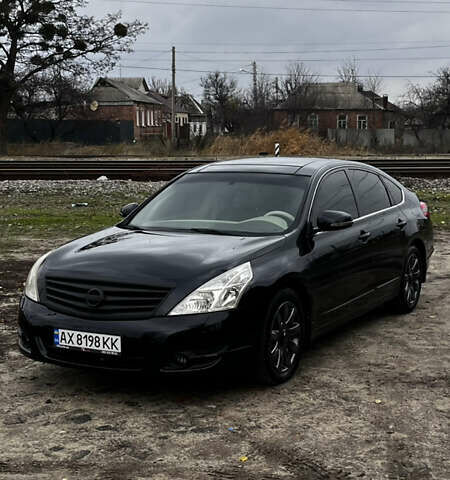 Черный Ниссан Теана, объемом двигателя 3.5 л и пробегом 215 тыс. км за 7700 $, фото 5 на Automoto.ua