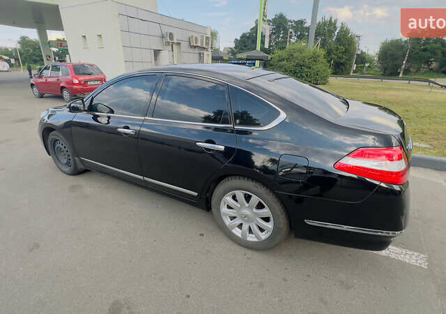 Черный Ниссан Теана, объемом двигателя 3.5 л и пробегом 180 тыс. км за 8100 $, фото 5 на Automoto.ua
