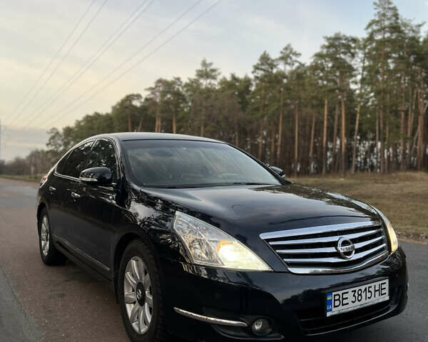 Черный Ниссан Теана, объемом двигателя 2.5 л и пробегом 190 тыс. км за 6900 $, фото 1 на Automoto.ua